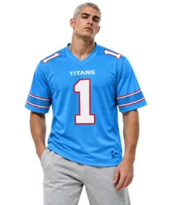 Male model wearing Cam Ward Tennessee Titans blue jersey with white number 1 and red-trimmed sleeves