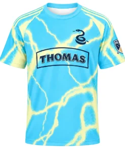 Cavan Sullivan 2026 Away Jersey front in cyan with yellow lightning graphics, snake emblem and THOMAS' wordmark