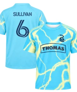 Front and back of Cavan Sullivan cyan away soccer jersey with lightning print and Sullivan No. 6