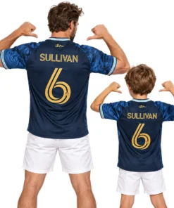 Father and son wearing matching Sullivan No. 6 Philadelphia Union navy jerseys