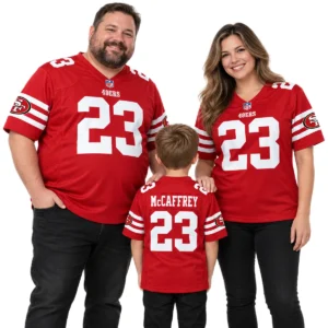 Father, mother and young son wearing matching red Christian McCaffrey 49ers number 23 football jerseys