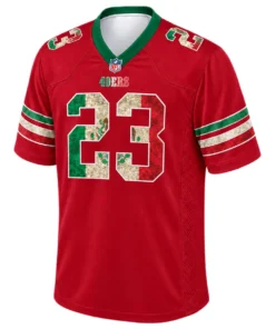 Front view of red Christian McCaffrey 49ers Mexico jersey featuring green camouflage number 23, gold outlines and green collar trim