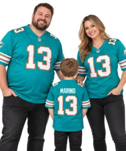 Family wearing matching aqua Miami Dolphins jersey styles with retro football details