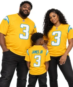 Family wearing matching Derwin James Jr. number 3 gold football jerseys