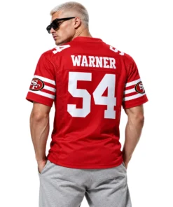Men wearing matching red 49ers football jerseys with Fred Warner number 54