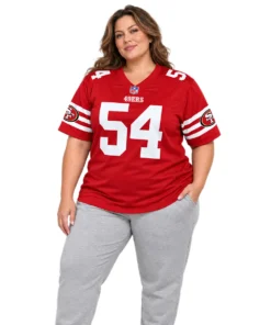 Women wearing a Fred Warner Red Jersey with white number 54 and striped sleeves