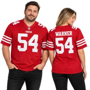 Man and woman modeling matching red Fred Warner 49ers jerseys, showing white number 54 on the front and WARNER lettering on the back