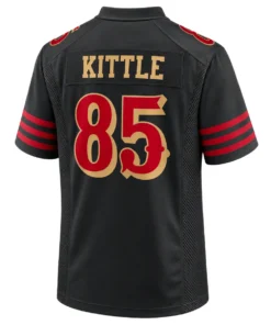 Back view of George Kittle black 49ers jersey featuring gold KITTLE lettering and red number 85 outlined in gold