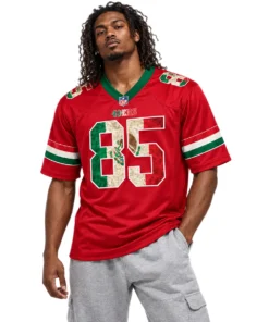 Male model wearing red George Kittle 49ers jersey with green camouflage number 85 and Mexican flag-inspired sleeve accents