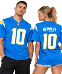 Model wearing a Justin Herbert Football Jersey in powder blue with white and gold details