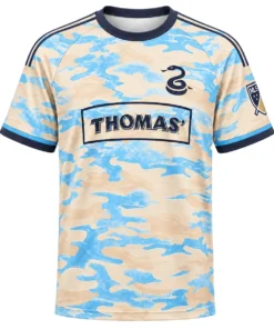Kid's Cavan Sullivan Cream Away Jersey front with sky-blue camouflage, THOMAS' wordmark and navy snake emblem