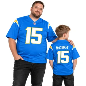 Adult and child wearing matching Ladd McConkey number 15 football jerseys