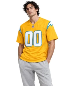 Model wearing a gold Los Angeles Chargers Alternate Jersey with blue bolt details