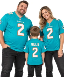 Family wearing matching Dolphins home jersey styles in aqua with white and orange accents