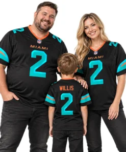 Family wearing matching black Miami football jerseys with aqua and orange accents