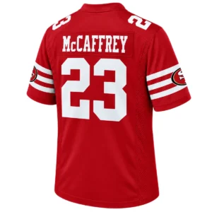 Back view of red Christian McCaffrey 49ers jersey with white McCAFFREY lettering, number 23 and striped sleeves