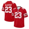 Men's Christian McCaffrey 49ers jersey front and back views featuring white number 23, McCAFFREY lettering and team sleeve patches