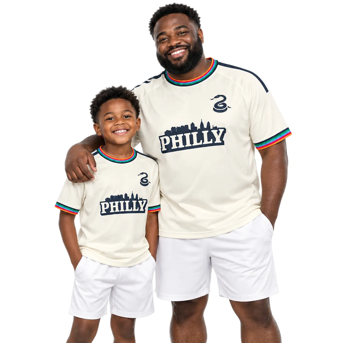 Father and son wearing matching Milan Iloski Philadelphia Union cream jerseys with ILOSKI No. 10