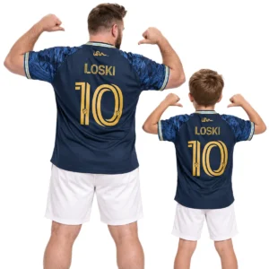 Father and son wearing matching Milan Iloski No. 10 Philadelphia Union navy home jerseys