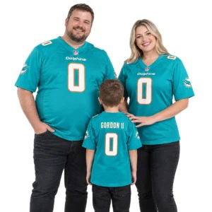 Family wearing matching Dolphins home football jersey styles in aqua