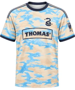 Philadelphia Union Away Jersey Throwback front with cream-blue camouflage pattern, snake emblem and THOMAS’ graphic