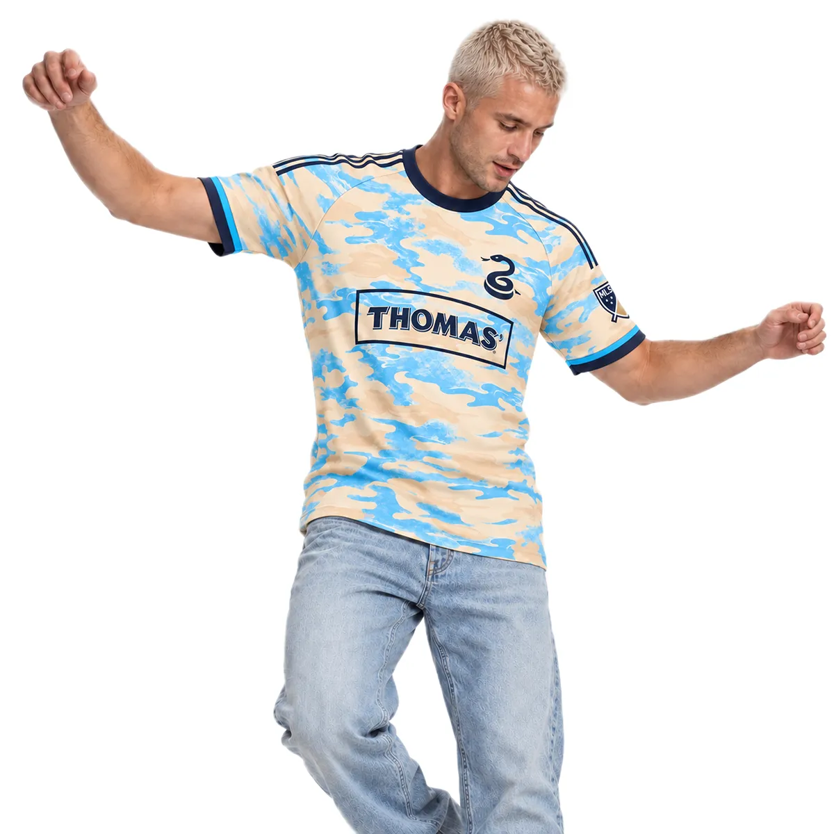 Model wearing cream and sky-blue Philadelphia Union retro soccer jersey with navy collar and chest graphics