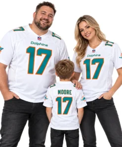 Family wearing matching Miami Dolphins away jersey styles in white