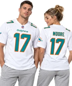 Model wearing a Moore #17 jersey in white with aqua and orange details